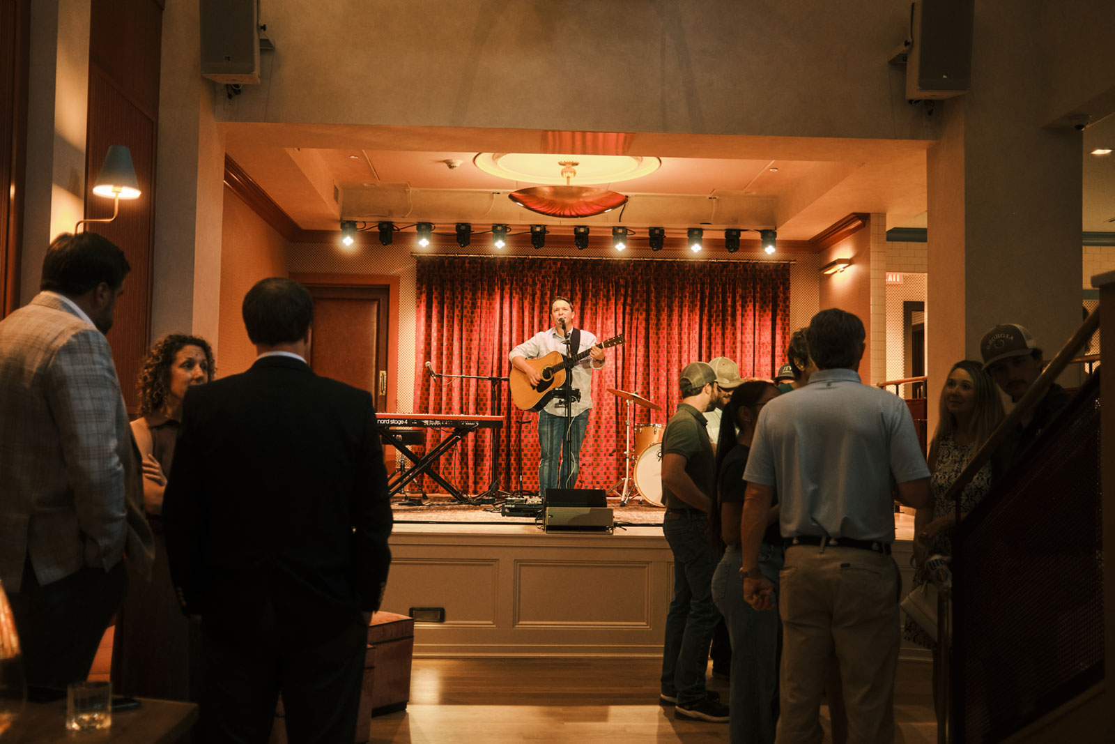 A jazz vocalist performing with a live band